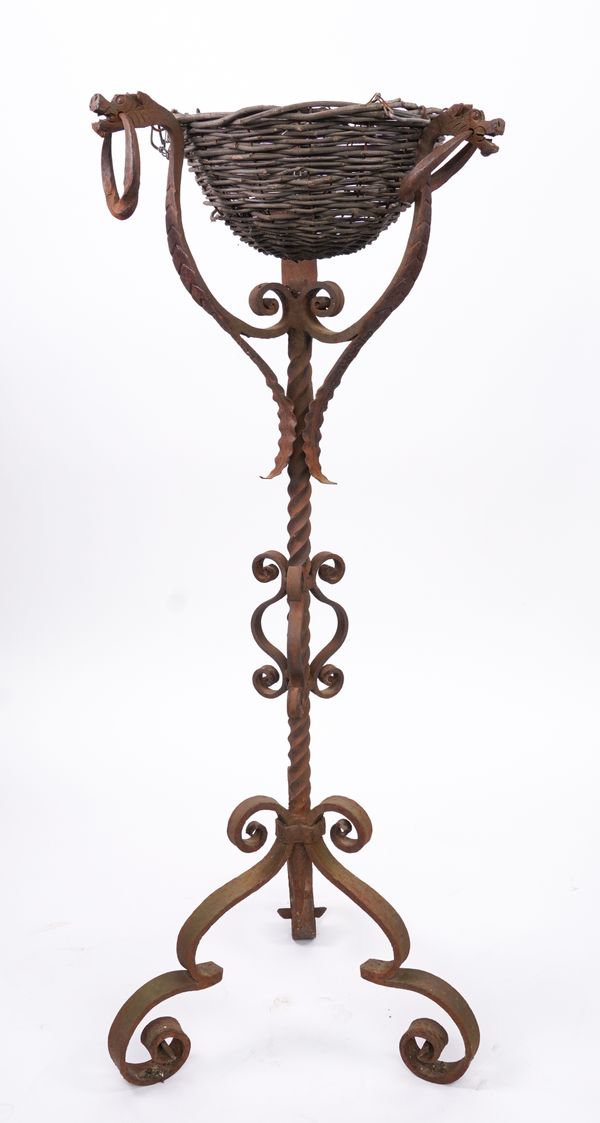 A WROUGHT IRON JARDINIERE STAND