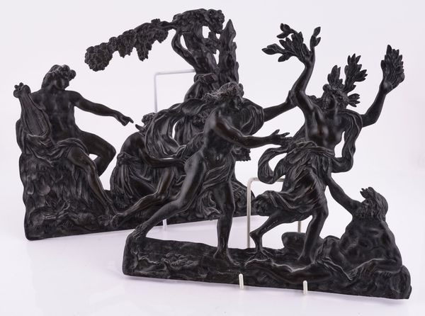 AFTER ANDRE-CHARLES BOULLE: A PAIR OF RELIEF CAST BRONZE FURNITURE MOUNTS (2)