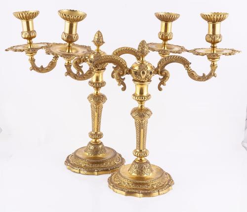 A PAIR OF ORMOLU TWIN-LIGHT CANDLESTICKS (2)