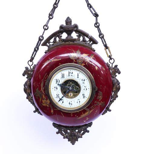 A FRENCH GILT-BRASS MOUNTED SANG-DE-BEOUF HANGING WALL CLOCK