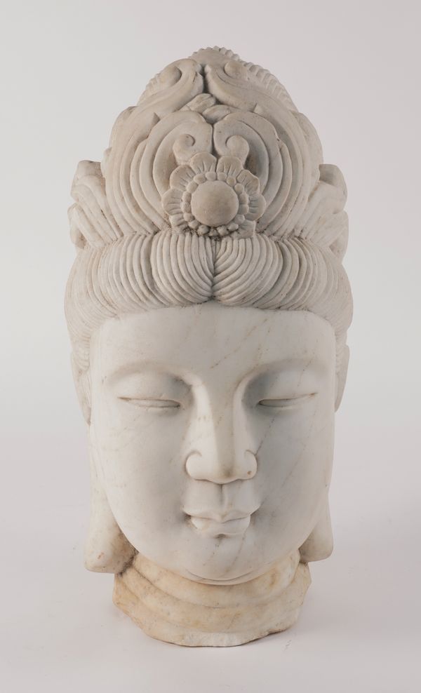 A CHINESE WHITE MARBLE HEAD OF GUAN Y'IN