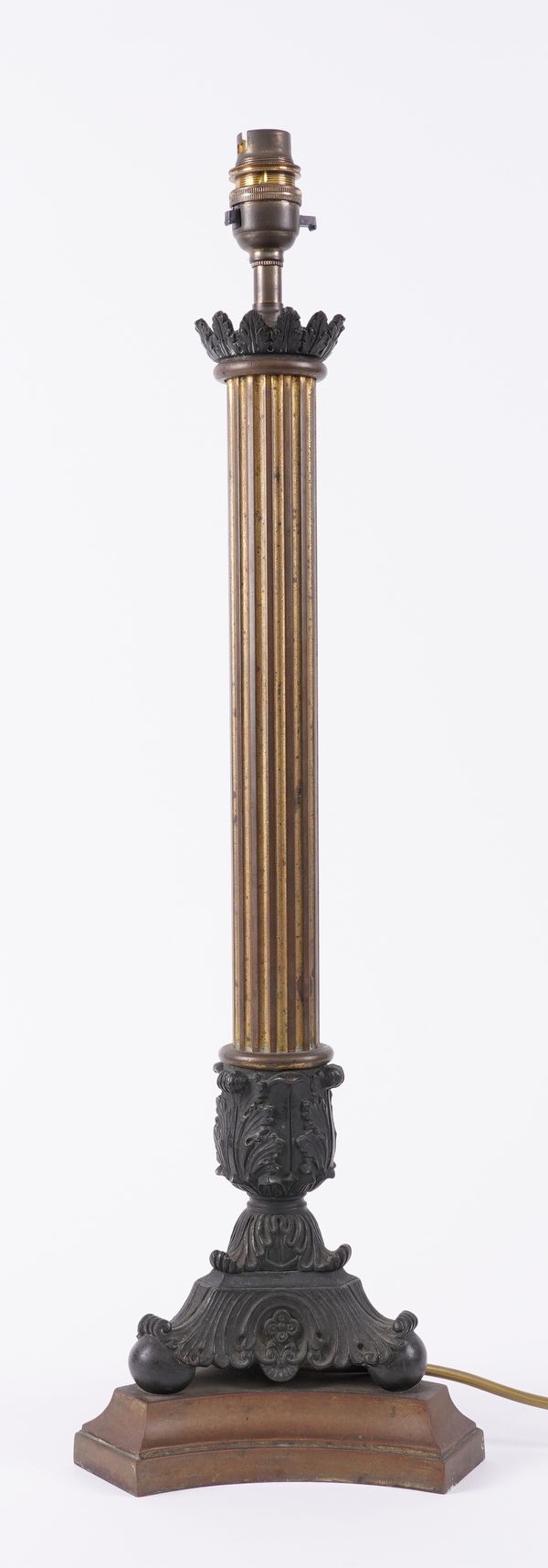A RESTAURATION STYLE GILT AND PATINATED BRASS FLUTED COLUMN TABLE LAMP
