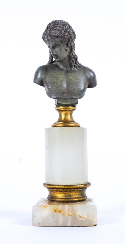 AN ITALIAN BRONZE BUST MOUNTED ON A GILT-METAL MOUNTED ONYX PEDESTAL
