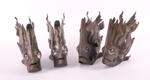MARK BRAZIER-JONES (NEW ZEALAND, B.1956): TWO PAIRS OF SCULPTURAL BURNISHED STEEL ‘ANGRY FISH’ CANDLEHOLDERS (4)