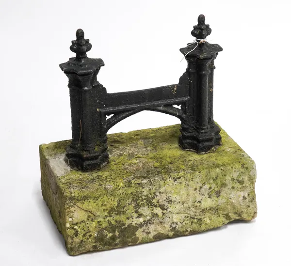 A VICTORIAN BLACK PAINTED CAST IRON BOOT SCRAPER