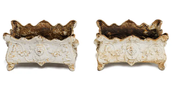 A PAIR OF WHITE PAINTED CAST IRON PLANTERS OR JARDINIÈRES (2)