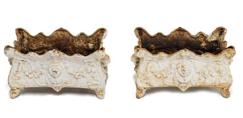 A PAIR OF WHITE PAINTED CAST IRON PLANTERS OR JARDINIÈRES (2)
