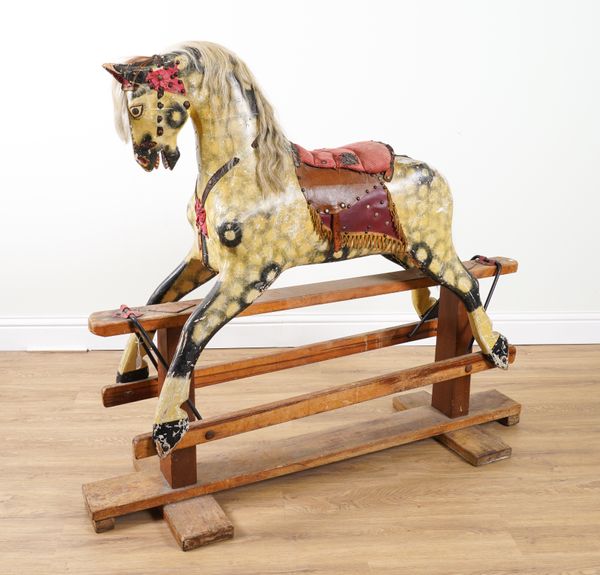 A DAPPLE GREY PAINTED PINE ROCKING HORSE