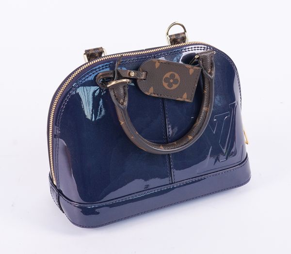 LOUIS VUITTON: BLUE VERNIS LISSE ALMA BAG