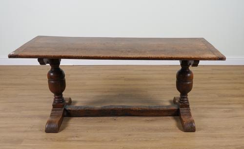 A 17TH CENTURY STYLE OAK CLEATED PLANK TOP REFECTORY TABLE