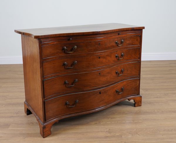 A GEORGE III SERPENTINE MAHOGANY FOUR DRAWER CHEST