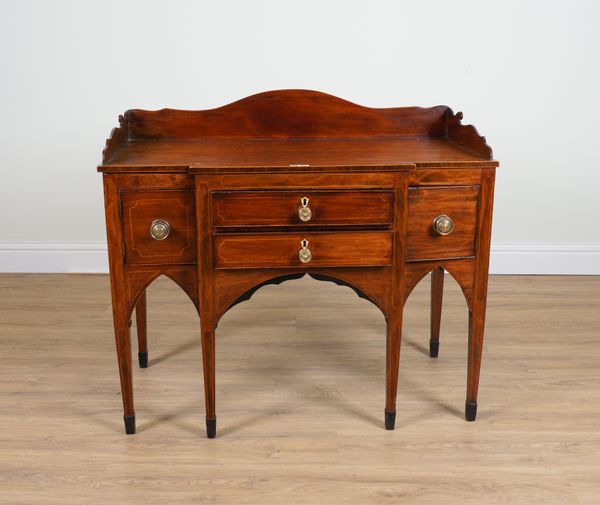 A GEORGE III INLAID MAHOGANY BREAKFRONT SIDEBOARD