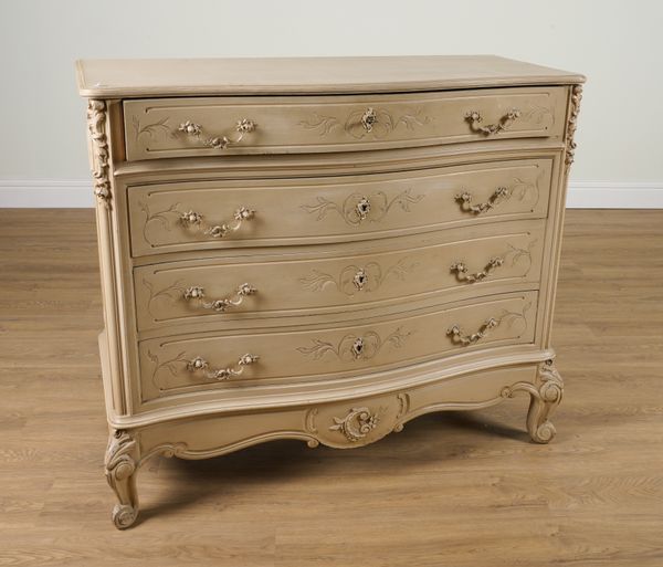 A 20TH CENTURY BUFF PAINTED CARVED FOUR DRAWER SERPENTINE CHEST