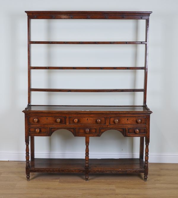 AN 18TH CENTURY OAK OPEN BACK POTBOARD DRESSER