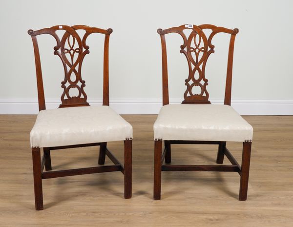 A PAIR OF GEORGE III MAHOGANY PIERCED SPLAT BACK SIDE CHAIRS (2)