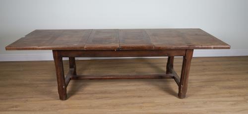 A FRENCH 18TH CENTURY STYLE OAK DRAW-LEAF EXTENDING KITCHEN TABLE