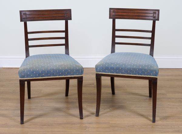 A PAIR OF REGENCY SABRE LEGGED MAHOGANY FRAMED TRIPLE BAR BACK SIDE CHAIRS (2)