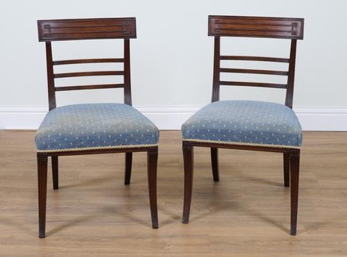 A PAIR OF REGENCY SABRE LEGGED MAHOGANY FRAMED TRIPLE BAR BACK SIDE CHAIRS (2)