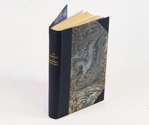 FIRST SOLVAY CONFERENCE - La Theorie du Rayonnement et les Quanta.