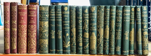 AUSTEN, Jane (1775-1817). Emma, London, 1898, 8vo, illustrations by "Chris." Hammond, original decorated cloth gilt. FIRST "HAMMOND" EDITION. With 18 other works in 19 vols. in decorated or pictorial cloth bindings gilt. (20)