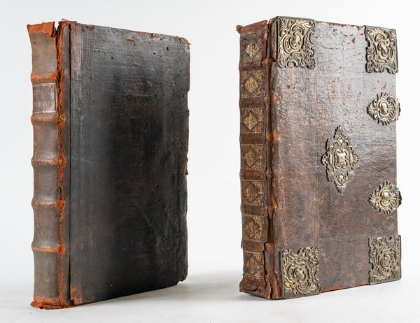 MISSALS, Roman - Missale Romanum, Antwerp, 1620, folio, 9 full-page engraved illustrations and borders, printed in red and black, contemporary calf over boards (rebacked, rather worn). With another Missal. The lot sold not subject to return. (2)