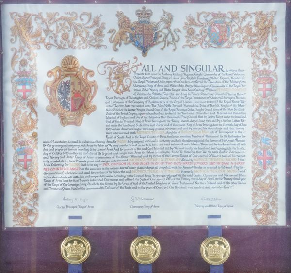 GRANT OF ARMS - A fine large calligraphic manuscript on vellum granting Arms to Edward Pineles, 1973, 550 x 680mm., framed and glazed.
