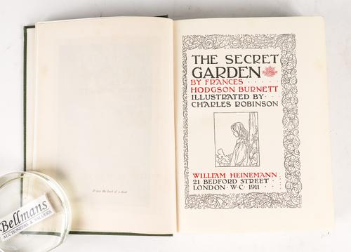 BURNETT, Frances Hodgson (1849-1924). The Secret Garden, London, 1911, square 8vo, 8 coloured plates by Charles Robinson, original green pictorial buckram gilt. FIRST U.K. EDITION.