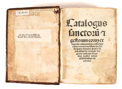 PETRUS DE NATALIBUS (1370-1400). Catalogus sanctorum, Venice, 1516, small 4to, woodcut illustrations and initials (staining, spotting and light browning), contemporary panelled calf elaborately decorated in blind.