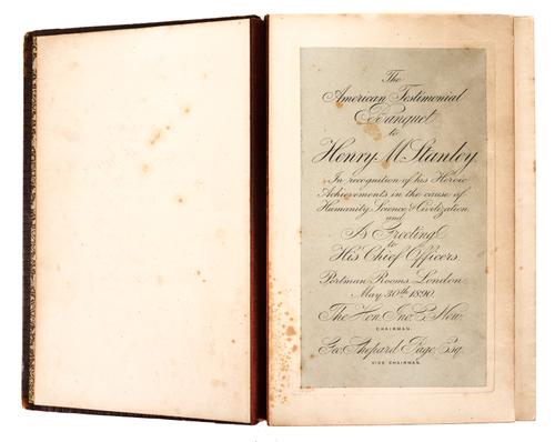 STANLEY, Henry Morton (1841-1904) - The American Testimonial Banquet to Henry M. Stanley, London, 1890, 6 photographs and the text on blue paper laid down on thick card, original "relievo"-style calf. FIRST AND ONLY EDITION. RARE.