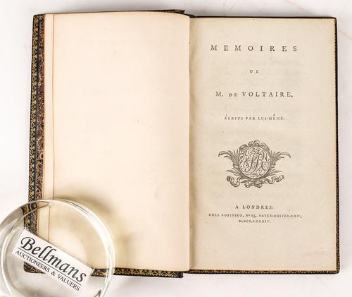 VOLTAIRE (1694-1778). Memoires, "Londres", 1784, 8vo, FINELY BOUND in contemporary blue calf elaborately decorated in gilt and blind, the covers with central crowned initial "P" stamped in gilt. With another work by the same author in 2 vols. (3)