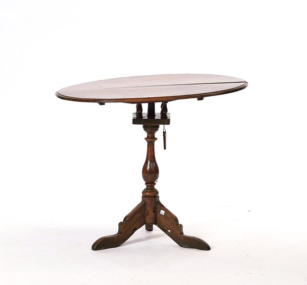 AN EARLY 18TH CENTURY OAK BIRD-CAGE TRIPOD TABLE