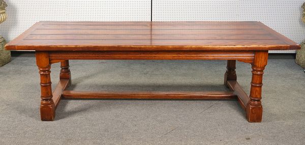 A LARGE 17TH CENTURY STYLE OAK PLANK TOP REFECTORY TABLE