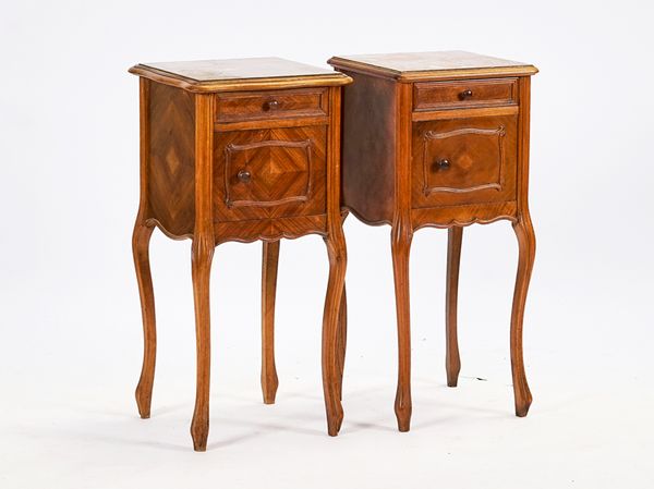 A NEAR PAIR OF FRENCH MARBLE TOP WALNUT BEDSIDE TABLES