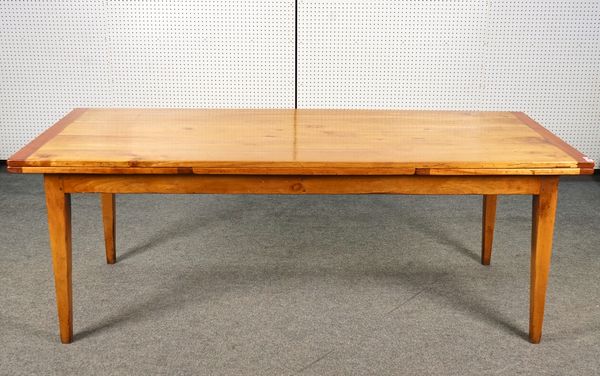 A 19TH CENTURY FRENCH FRUITWOOD EXTENDING  KITCHEN TABLE