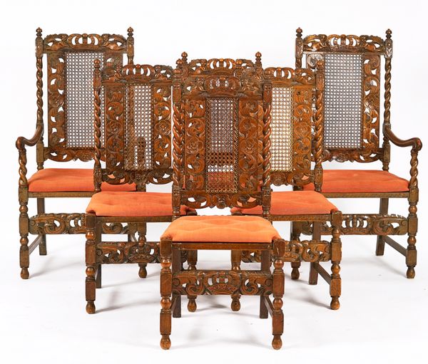 A SET OF TWELVE 17TH CENTURY STYLE CARVED OAK DINING CHAIRS