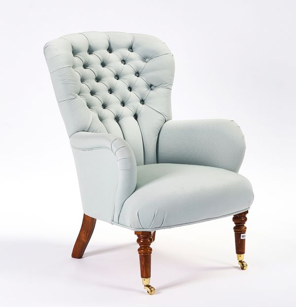 ‘ASHLEY LAWRENCE’; A VICTORIAN STYLE BUTTONED BACK EASY ARMCHAIR