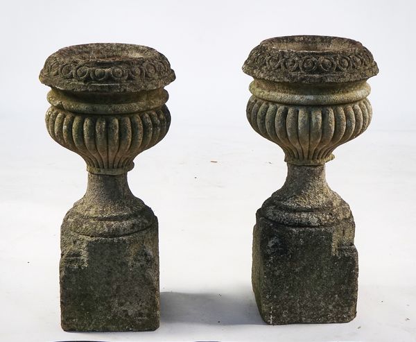 A PAIR OF 19TH CENTURY CARVED SANDSTONE JARDINERES