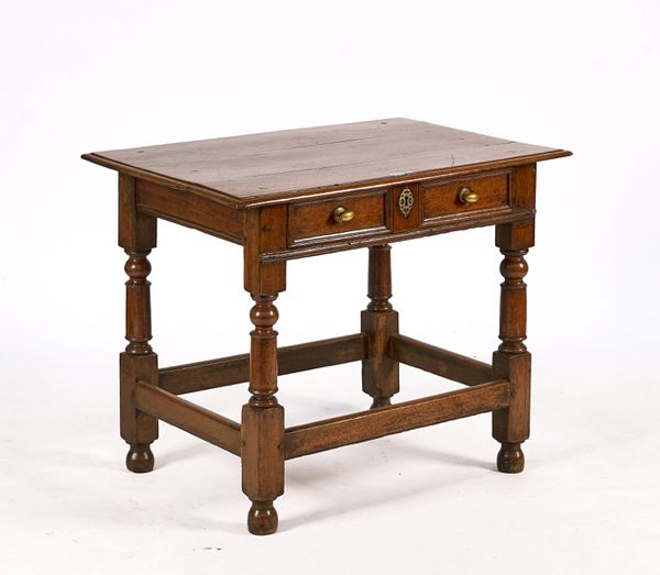 A CHARLES II OAK SINGLE DRAWER SIDE TABLE