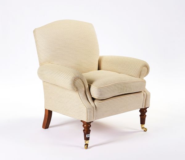 ‘ASHLEY LAWRENCE’; A VICTORIAN STYLE EASY ARMCHAIR