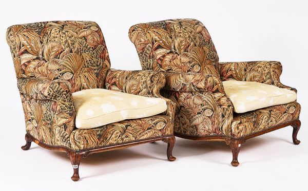 A PAIR OF MAHOGANY FRAMED EASY ARMCHAIRS