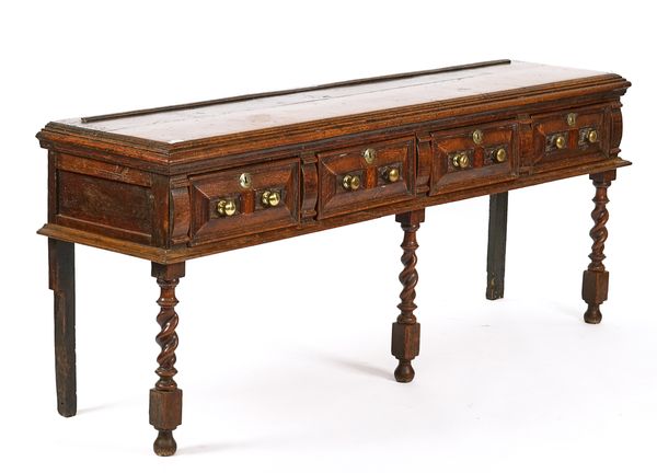 A CHARLES II JOINED OAK FOUR-DRAWER DRESSER