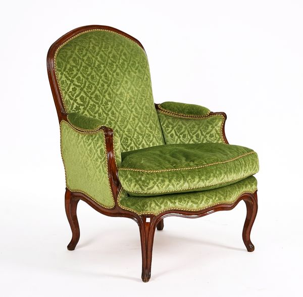 A LOUIS XV CARVED BEECH FRAMED TUB BACK ARMCHAIR