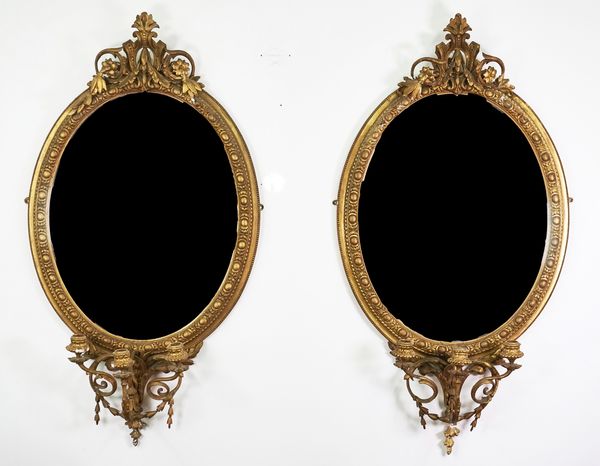 CHARLES NOSETTI; A PAIR OF VICTORIAN GILTWOOD AND COMPOSITION GIRANDOLE MIRRORS