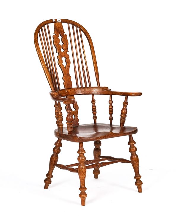 A VICTORIAN STYLE BEECH AND ELM WINDSOR ARMCHAIR