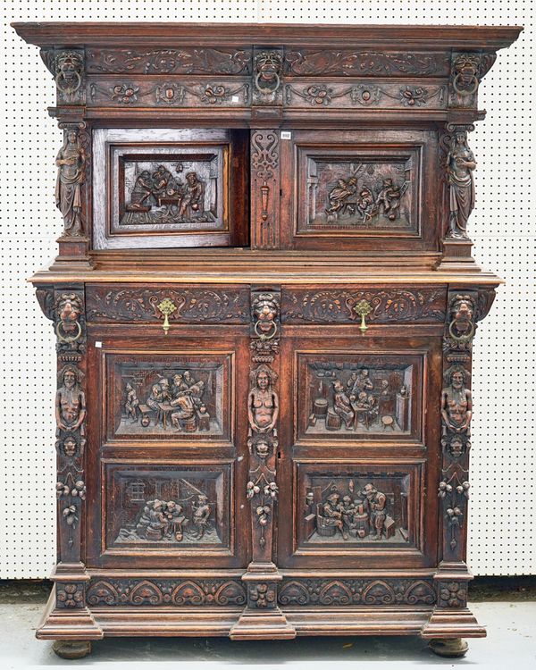 A VICTORIAN CARVED OAK COURT CUPBOARD