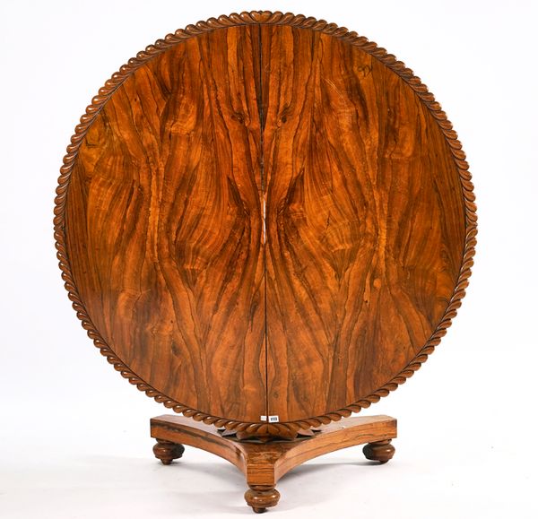 A REGENCY ROSEWOOD CIRCULAR SNAP TOP CENTRE TABLE