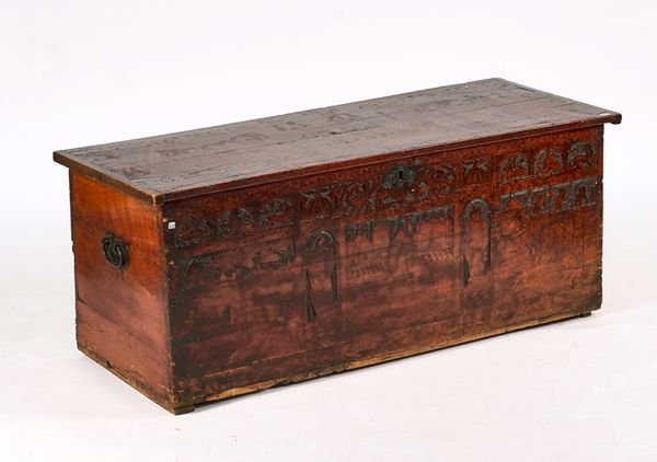 A 17TH CENTURY CYPRUS-WOOD AND PEN-DECORATED BOARDED CHEST