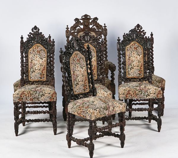 A MATCHED SET OF SEVEN VICTORIAN CARVED OAK DINING CHAIRS OF 17TH CENTURY STYLE