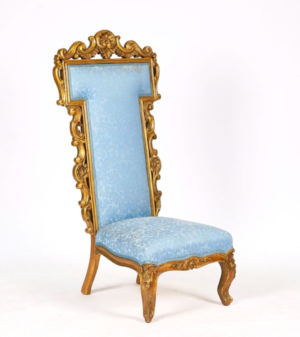 A LATE VICTORIAN GILTWOOD PRE DIEU CHAIR