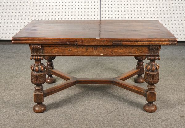 A 17TH CENTURY STYLE OAK DRAW-LEAF REFECTORY TABLE